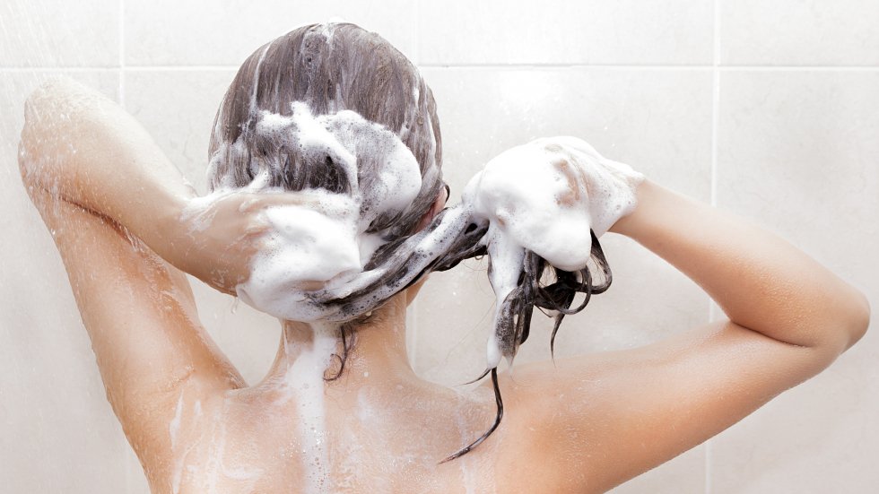 Girl washes hair showers - chemicals early puberty
