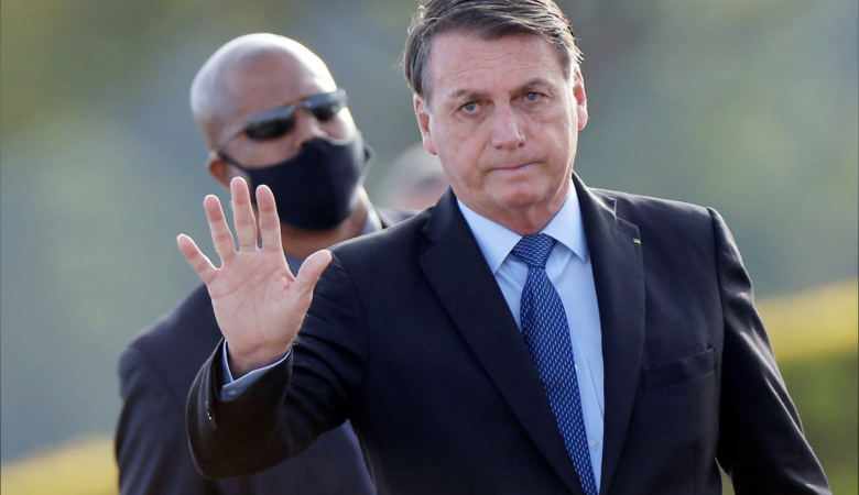 Brazil's President Jair Bolsonaro Gestures Before A National Flag Hoisting Ceremony In Front Of Alvorada Palace, Amid The Coronavirus Disease