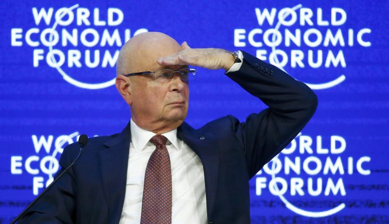 Wef Founder Schwab Gestures During The Official Opening Session Of The Annual Meeting Of The Wef In Davos