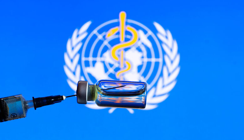 In This Photo Illustration A Medical Syringe With A Bottle