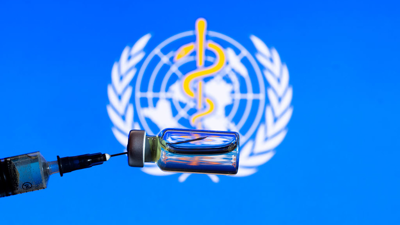 In This Photo Illustration A Medical Syringe With A Bottle