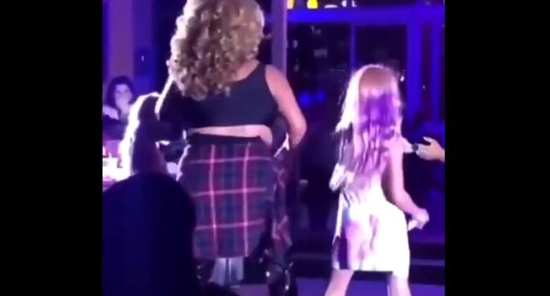 disgusting video shows children being paraded around drag queen show taking cash tips