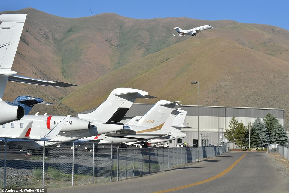 private jets are seen lined up at the air field in sun valley on wednesday, where a discussion on climate change was held on friday